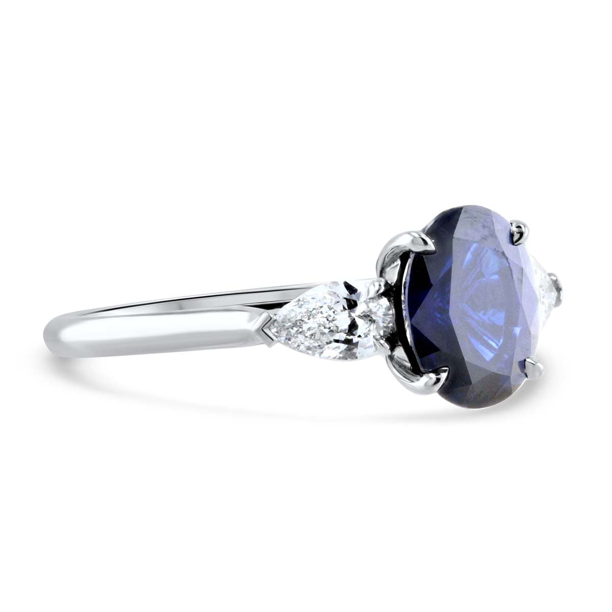 Darling Sapphire and Pear Shape Three Stone Ring
