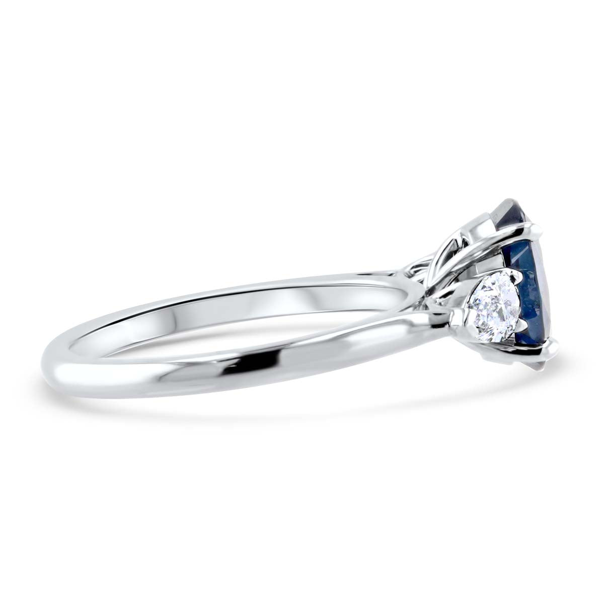 Darling Sapphire and Pear Shape Three Stone Ring