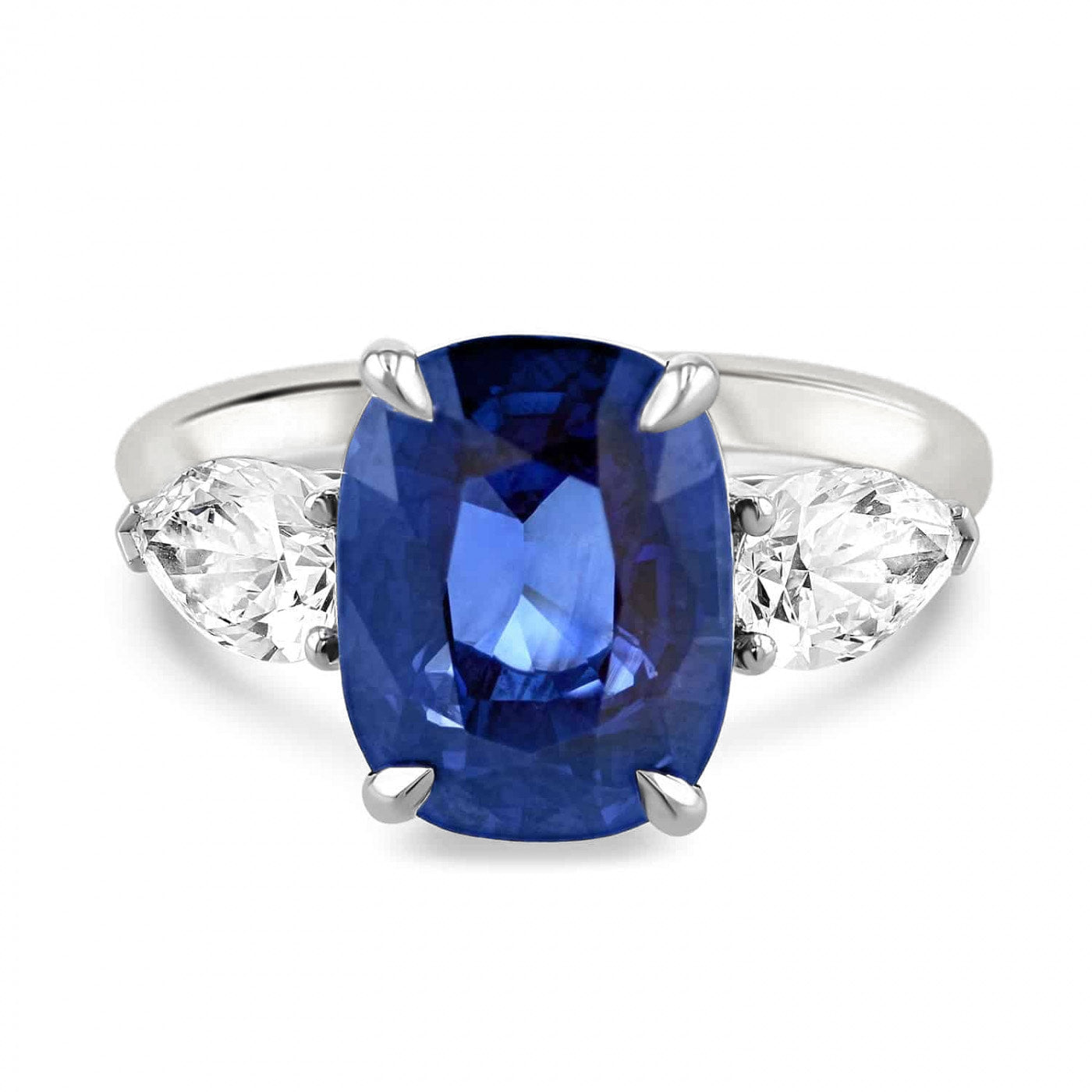 Lumine Sapphire and Pear Shape Three Stone Ring