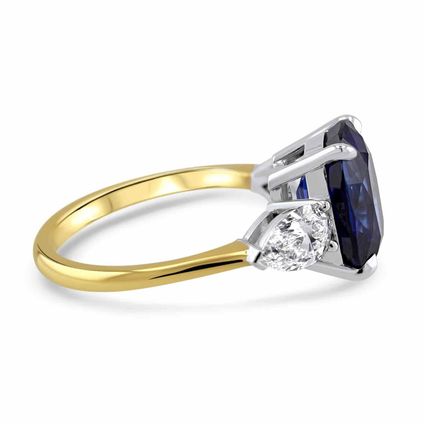 Lumine Sapphire and Pear Shape Three Stone Ring