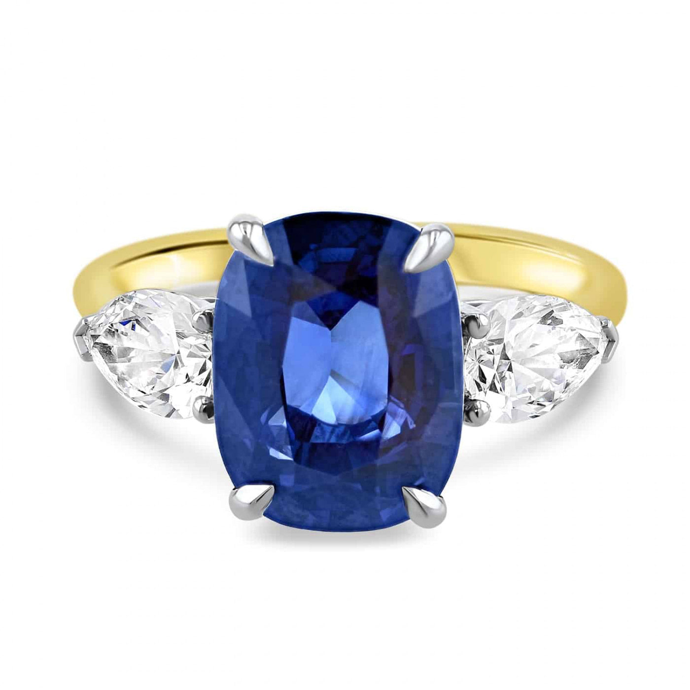 Lumine Sapphire and Pear Shape Three Stone Ring