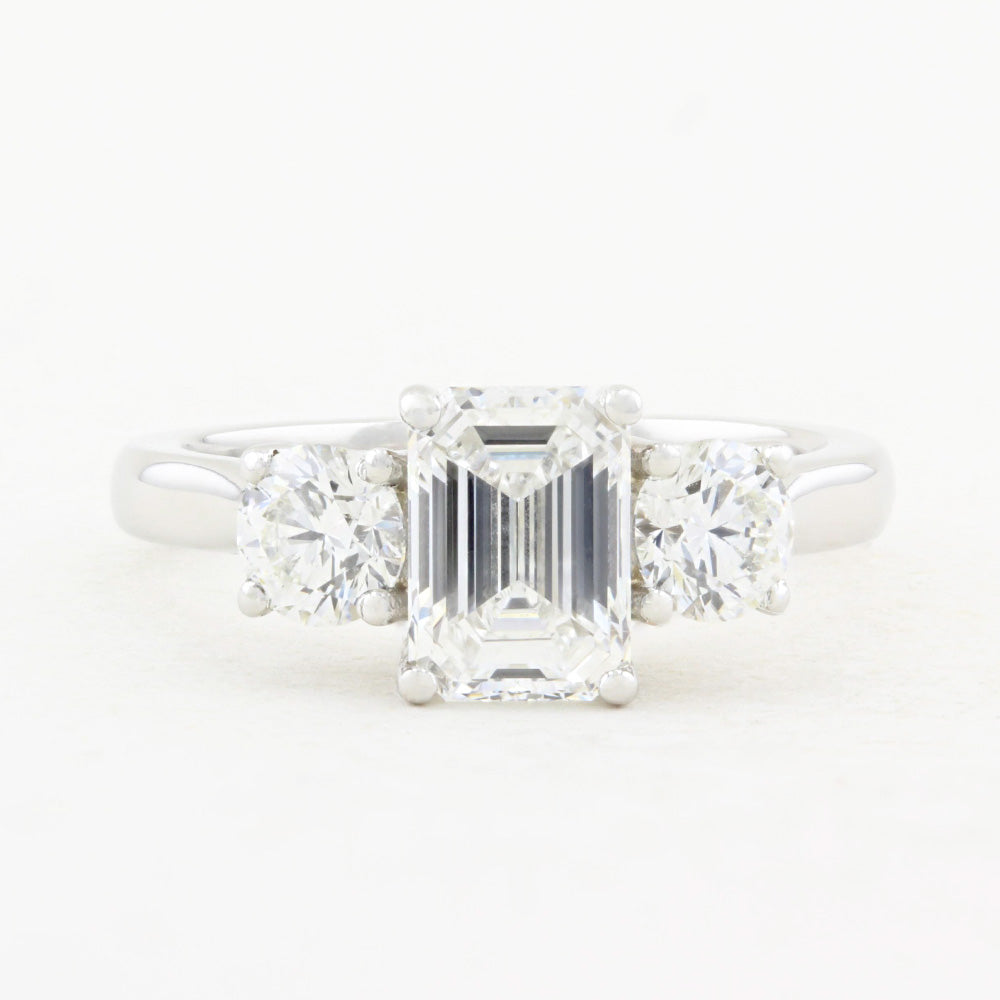 1.80ct Emerald Cut and Round Diamond Three Stone Engagement Ring