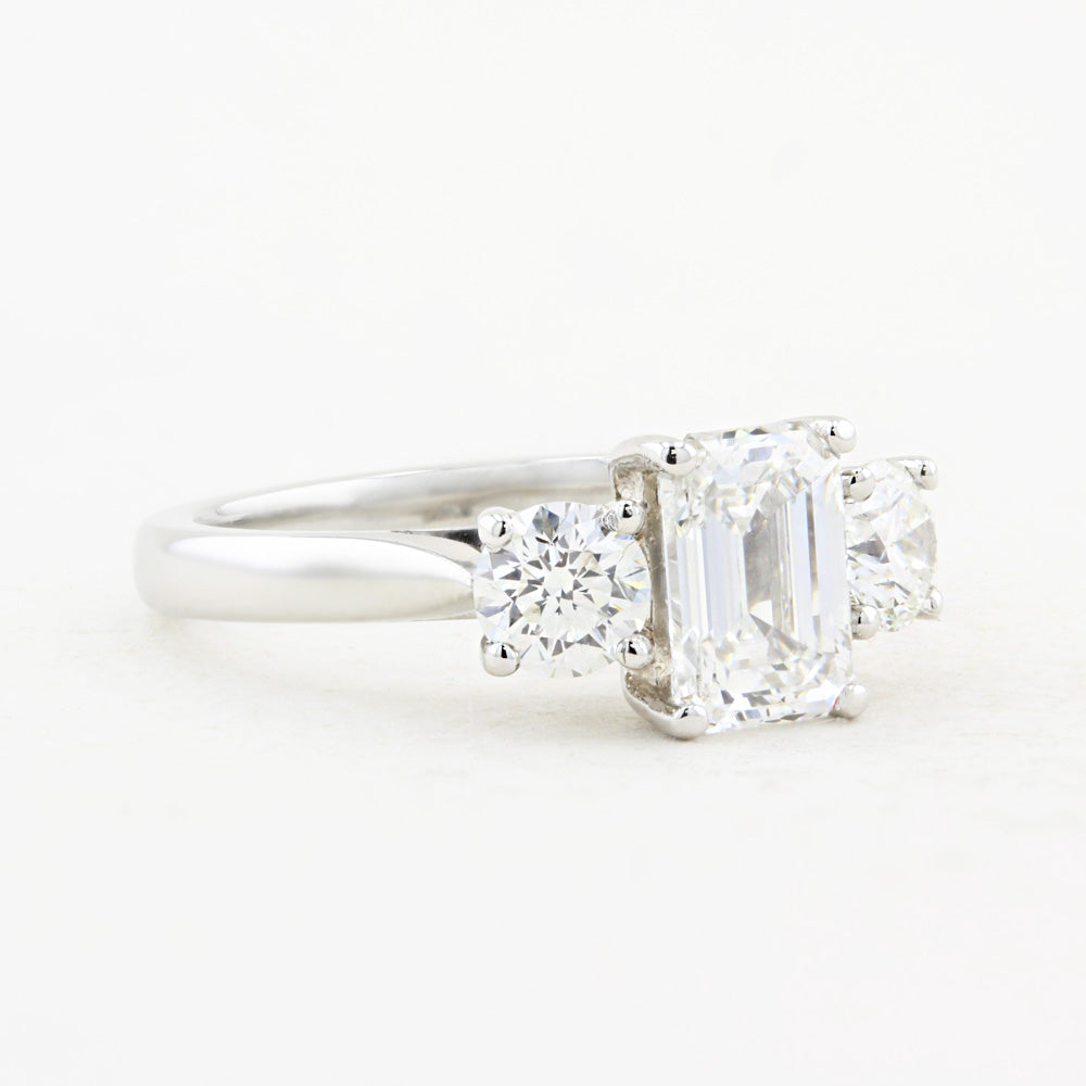 1.80ct Emerald Cut and Round Diamond Three Stone Engagement Ring