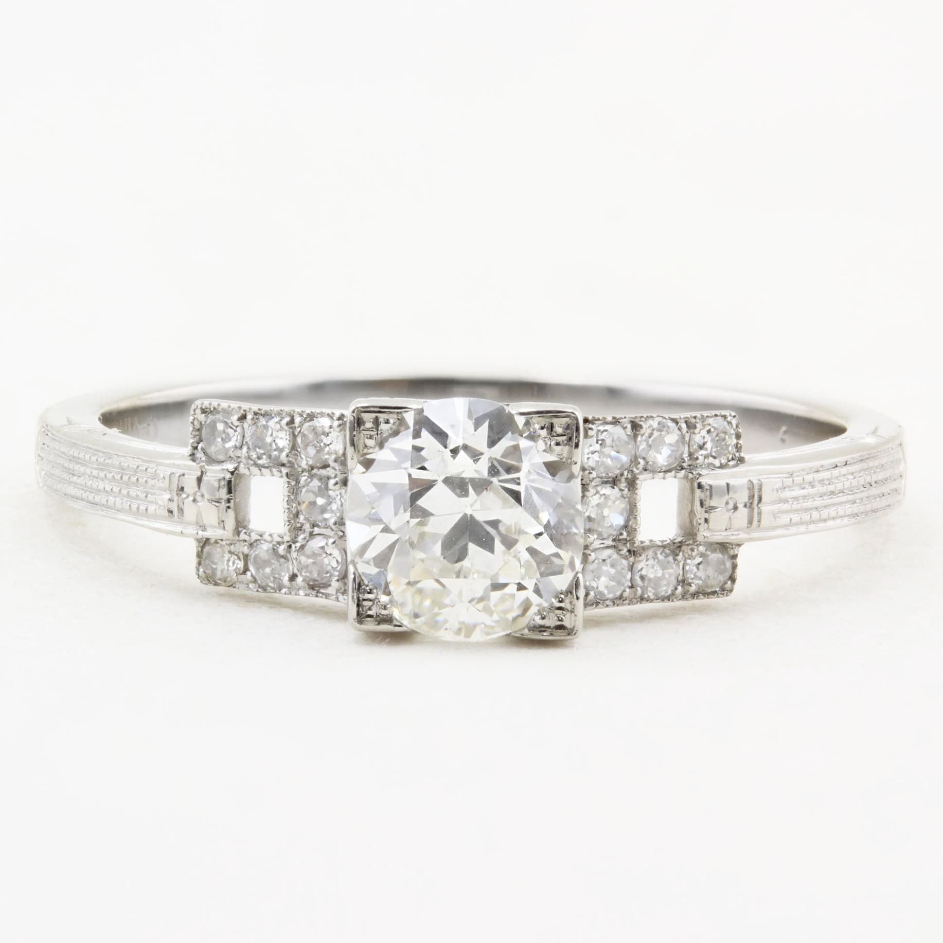 art deco Diamond ring with a white background