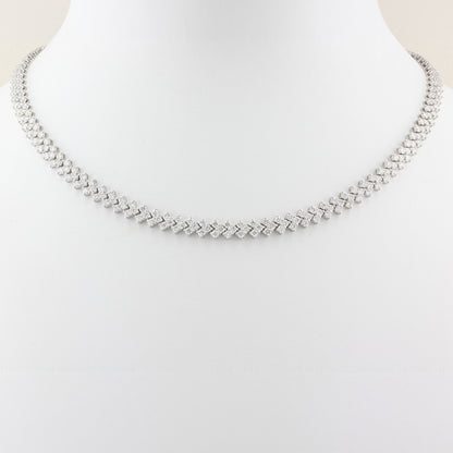 white gold tennis necklace on a white background