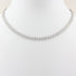 white gold tennis necklace on a white background
