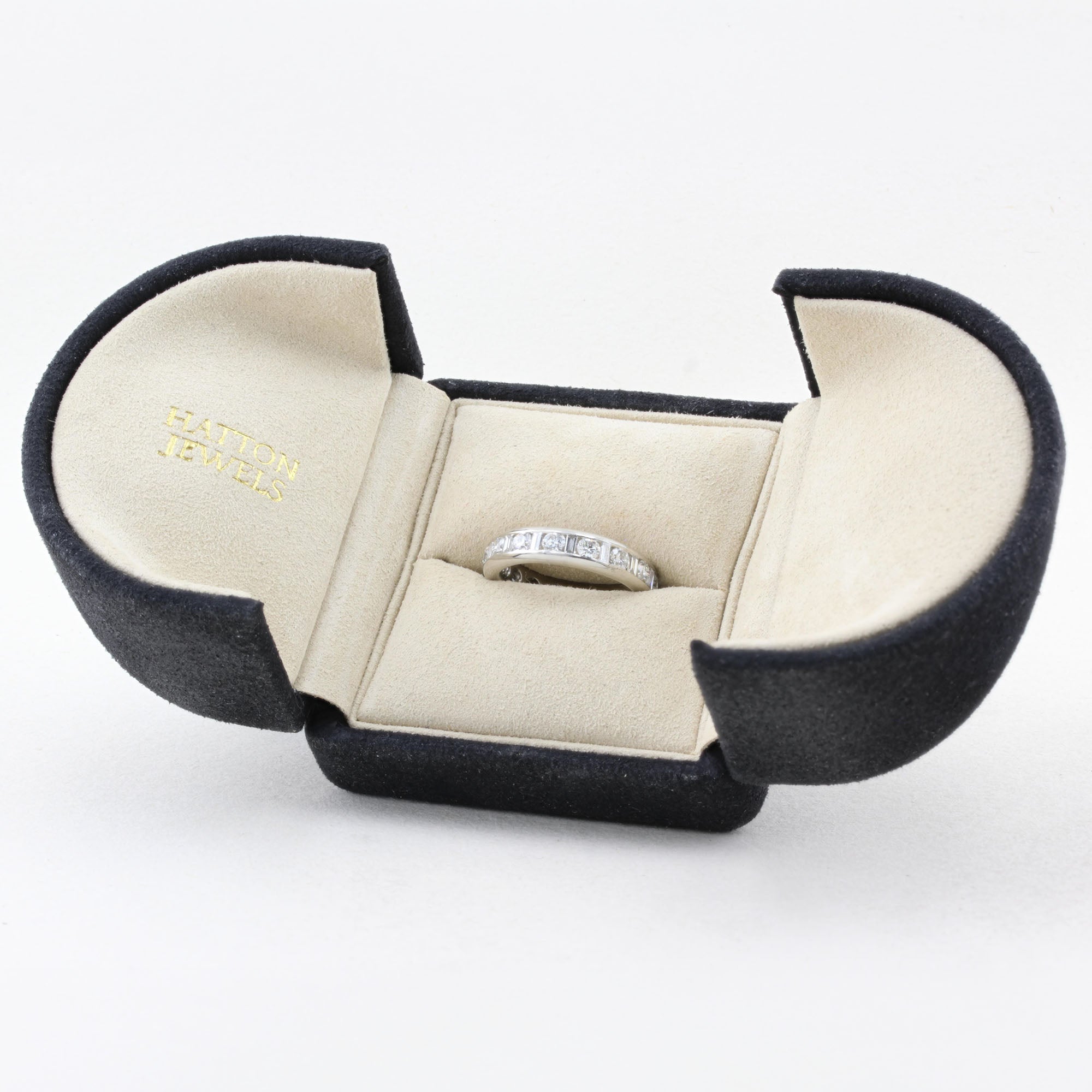 Baguette and Brilliant Cut Diamond Eternity Ring