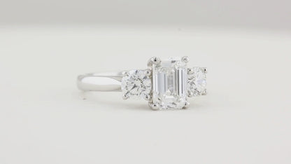 1.80ct Emerald Cut and Round Diamond Three Stone Engagement Ring
